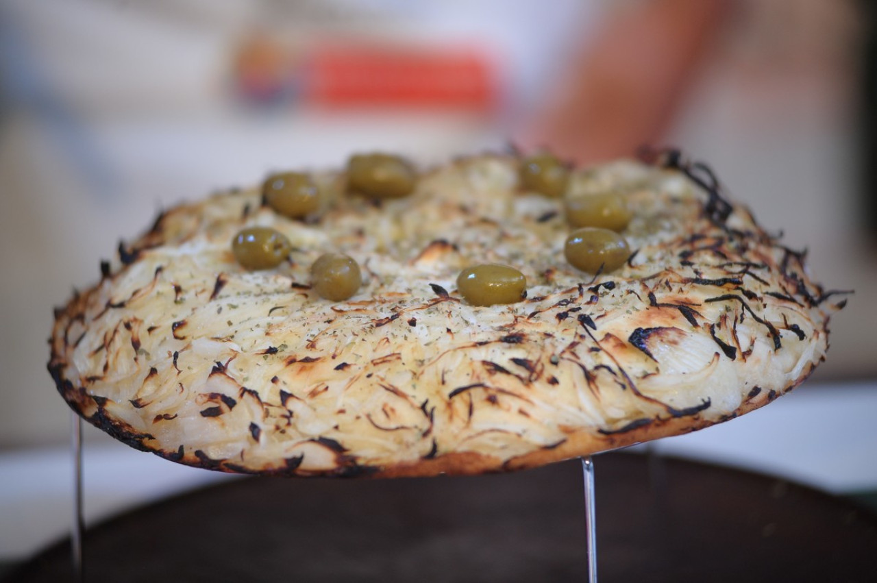 Fugazzetta; pizza; pizzería. Foto: Unsplash.