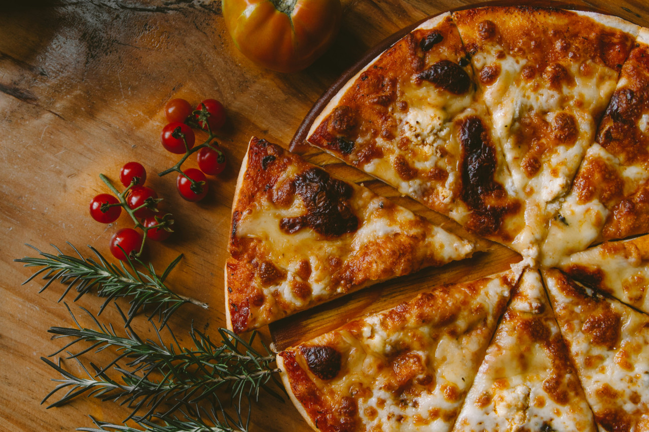Pizza, pizzería. Foto: Unsplash.