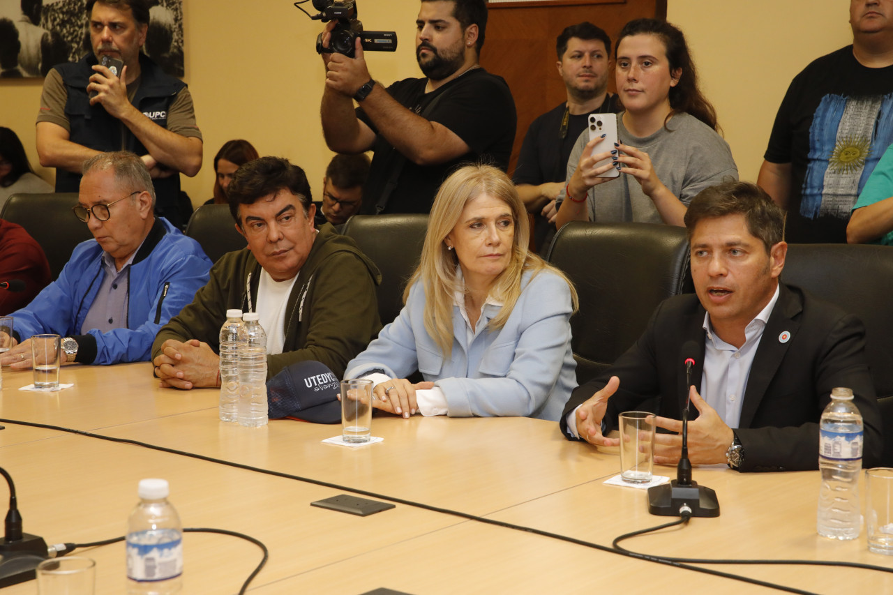 Fernando Espinoza, Verónica Magario y Axel Kicillof. Día del Trabajador.